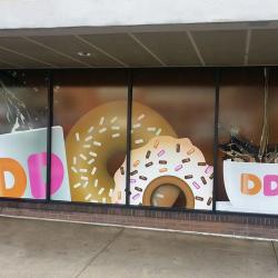 Dunkin Donuts Window Wall Ad Graphics: Dynamic Window Wall Ad Graphics at Dunkin Donuts by Atlantic Sun Control.