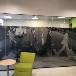 Beatles Band Image on Privacy Glass: Atlantic Sun Control's Privacy Window Film Featuring the Iconic Beatles Band Image: Where Classic Meets Modern.